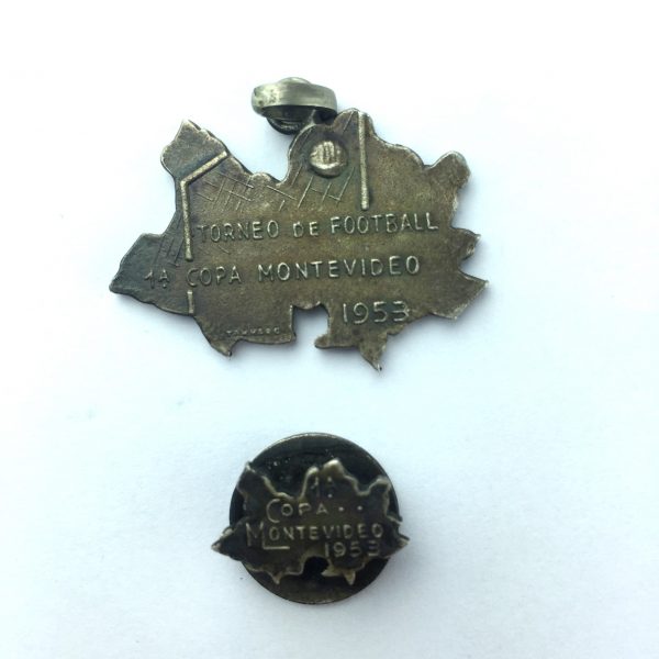 Medalla y pin en cobre plateado