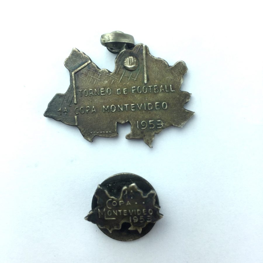 Medalla y pin en cobre plateado