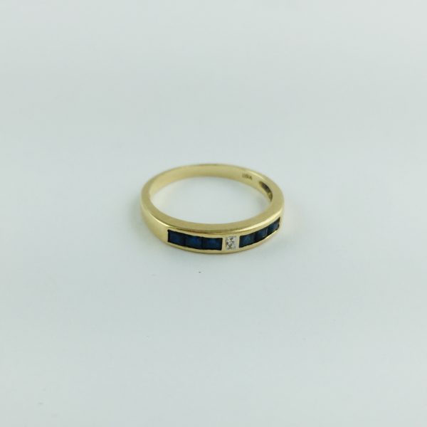 Anillo oro 18 K, brillante y zafiros