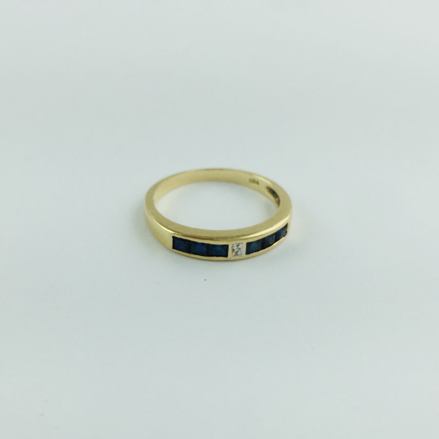 Anillo oro 18 K, brillante y zafiros