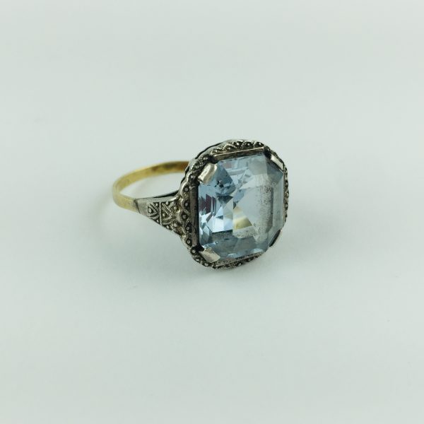Anillo oro 18 K, plata y piedra color celeste