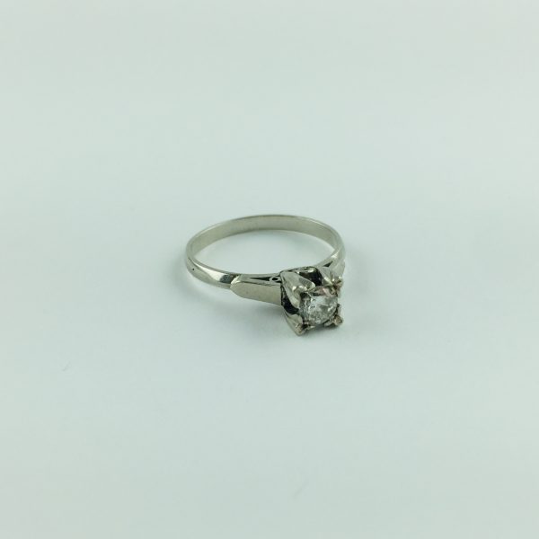 Anillo solitario oro 18 K y brillante