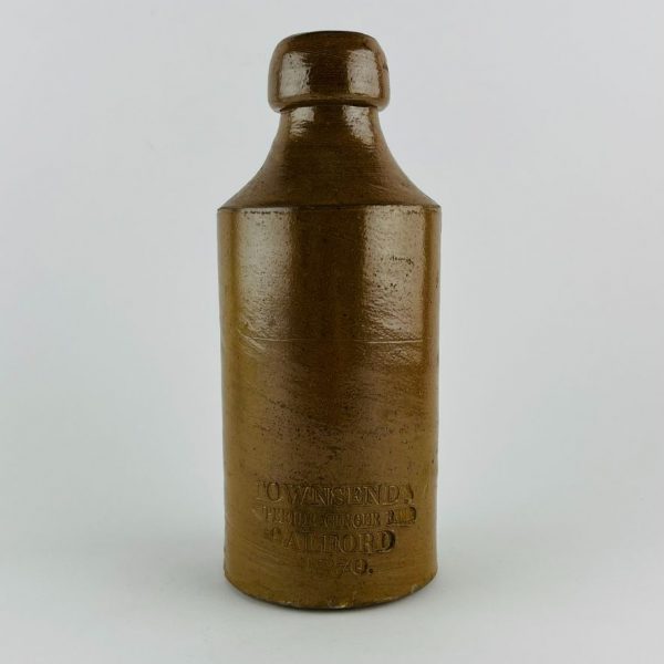 Tres botellas inglesas en gres