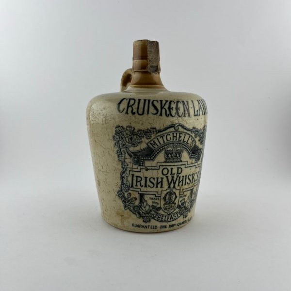 Botella de whisky en gres
