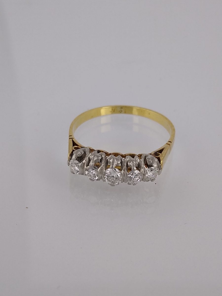 Anillo oro 18 K y brillantes