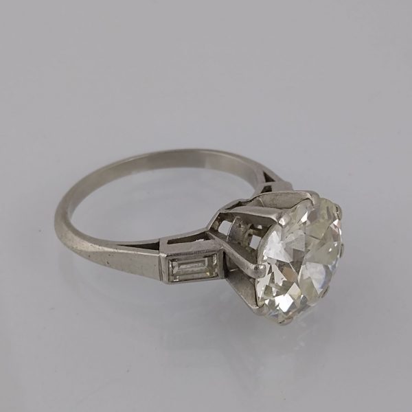 Anillo oro 18 K, brillante y diamantes
