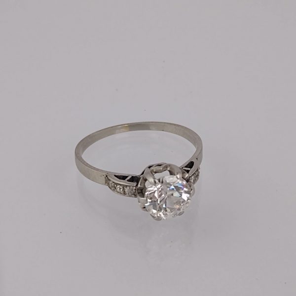 Anillo oro 18 K, brillante y diamantes