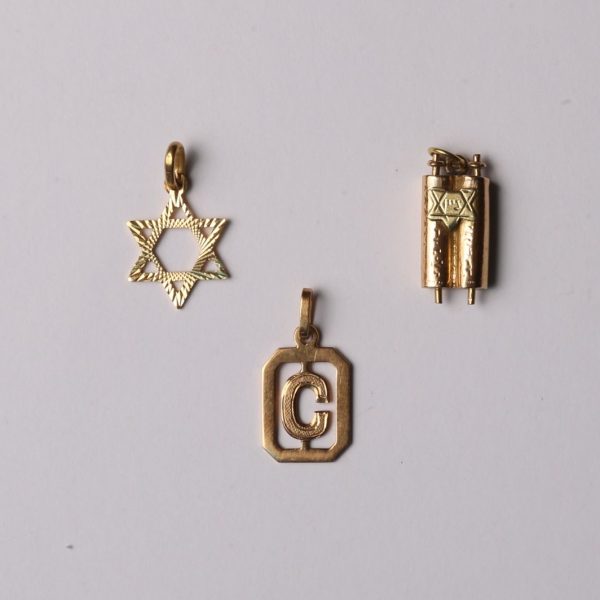 Dijes oro 18 K