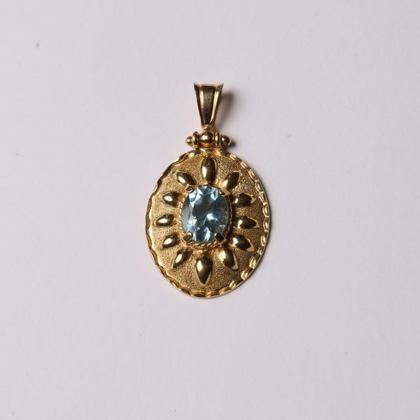 Colgante oro 18 K y topacio