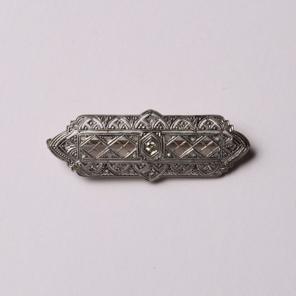 Plaqueta art decó oro 18 K, brillante y diamantes