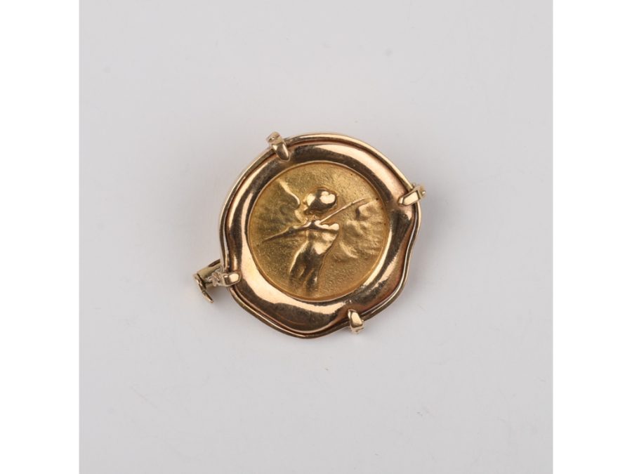 Prendedor oro