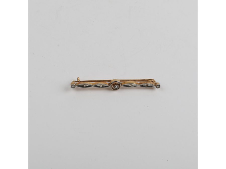 Prendedor oro 18 K, brillante y diamantes