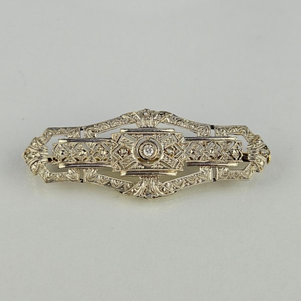 Prendedor oro 18 K blanco y amarillo, brillante y diamantes