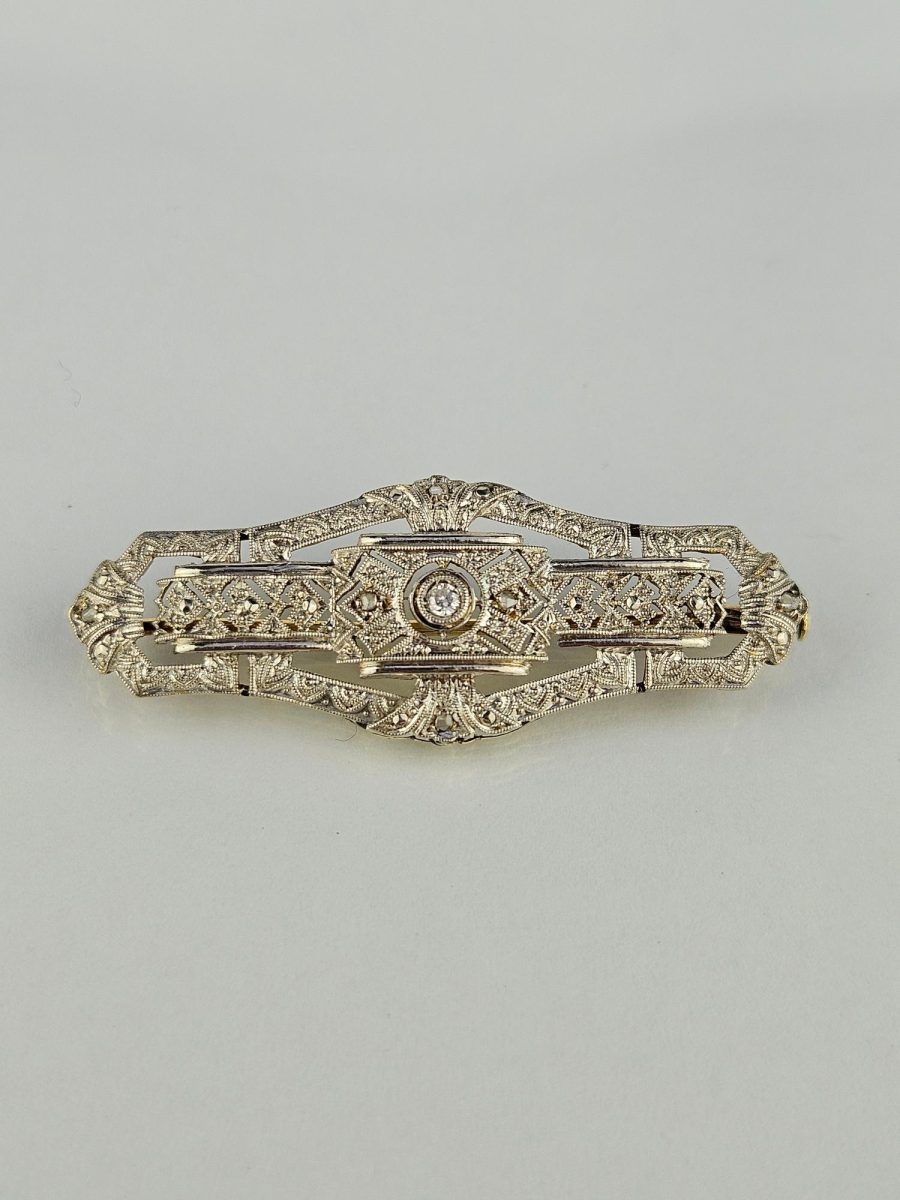 Prendedor oro 18 K blanco y amarillo, brillante y diamantes