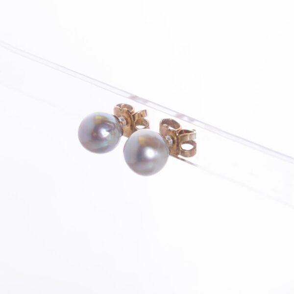 Tornillos en oro y perlas