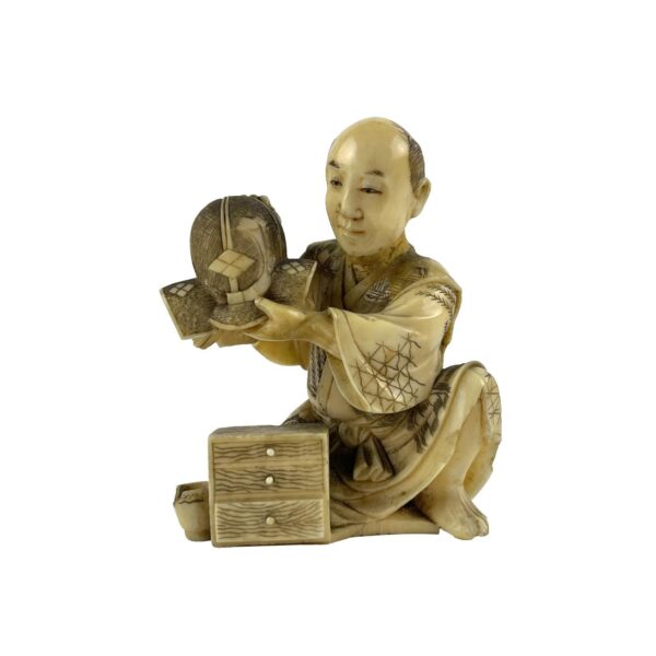 Okimono japonés en marfil
