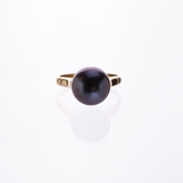 Anillo en oro 18 K con perla negra